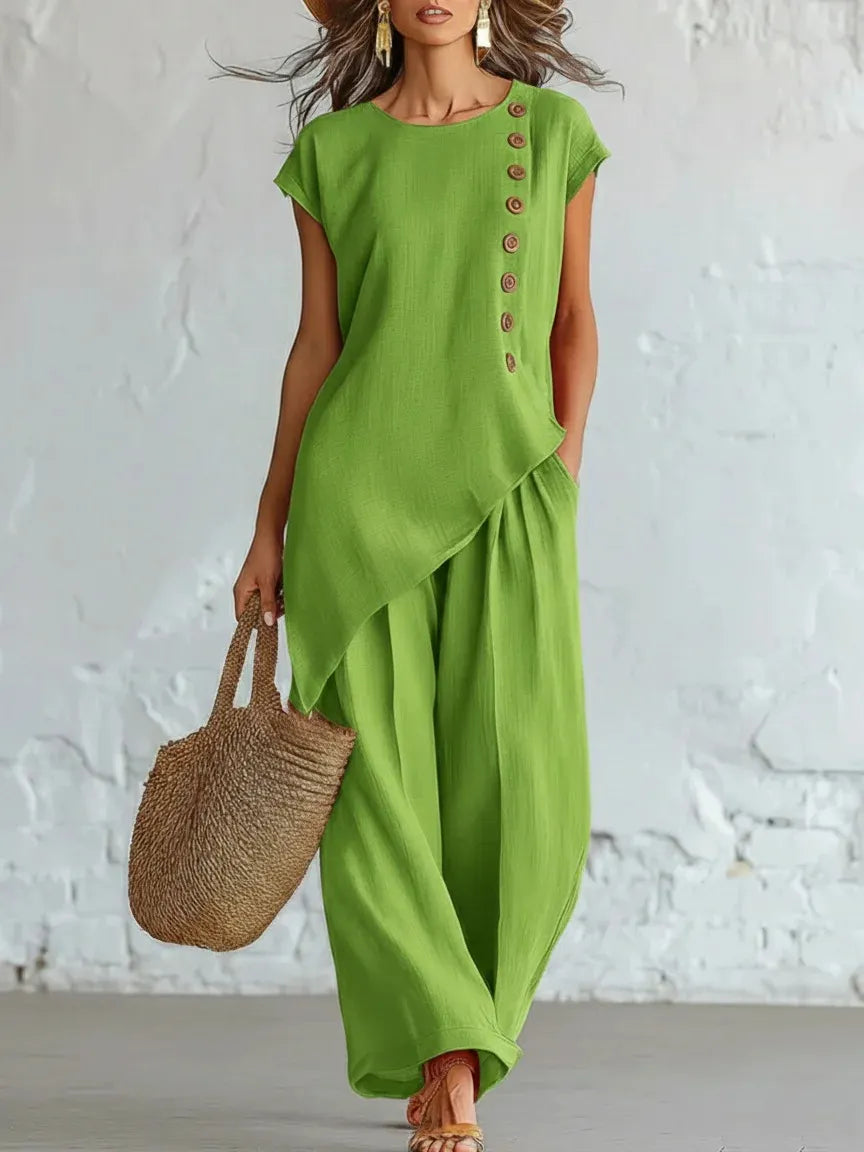A round-neck, asymmetrical short-sleeved top and wide-leg trousers set with wooden buttons