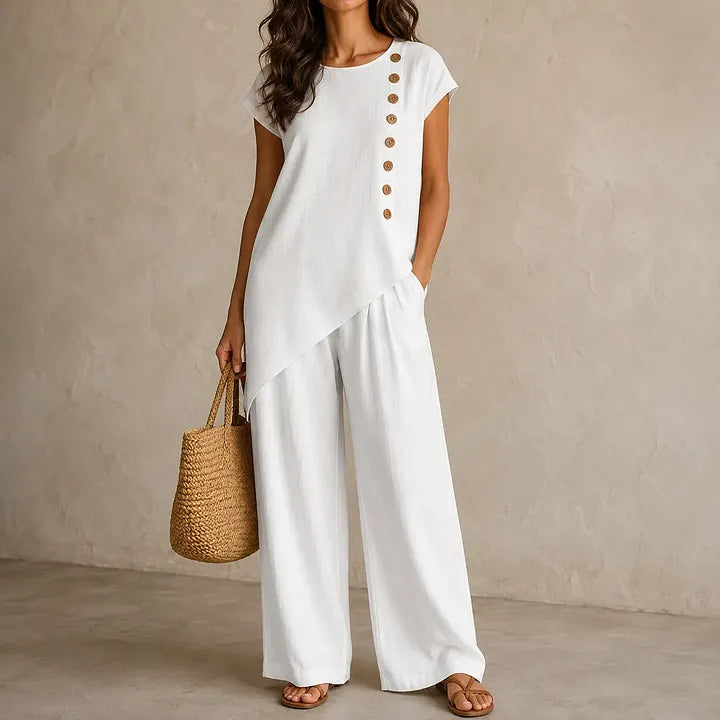 A round-neck, asymmetrical short-sleeved top and wide-leg trousers set with wooden buttons
