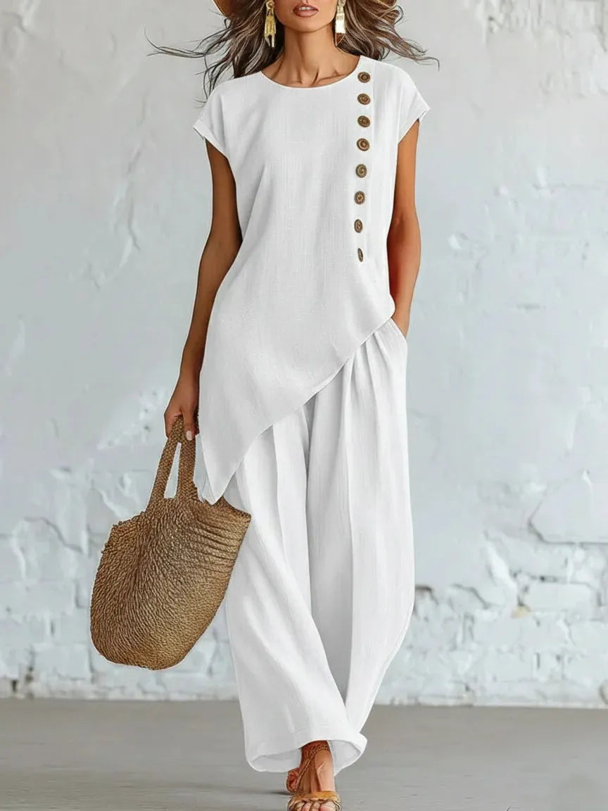A round-neck, asymmetrical short-sleeved top and wide-leg trousers set with wooden buttons